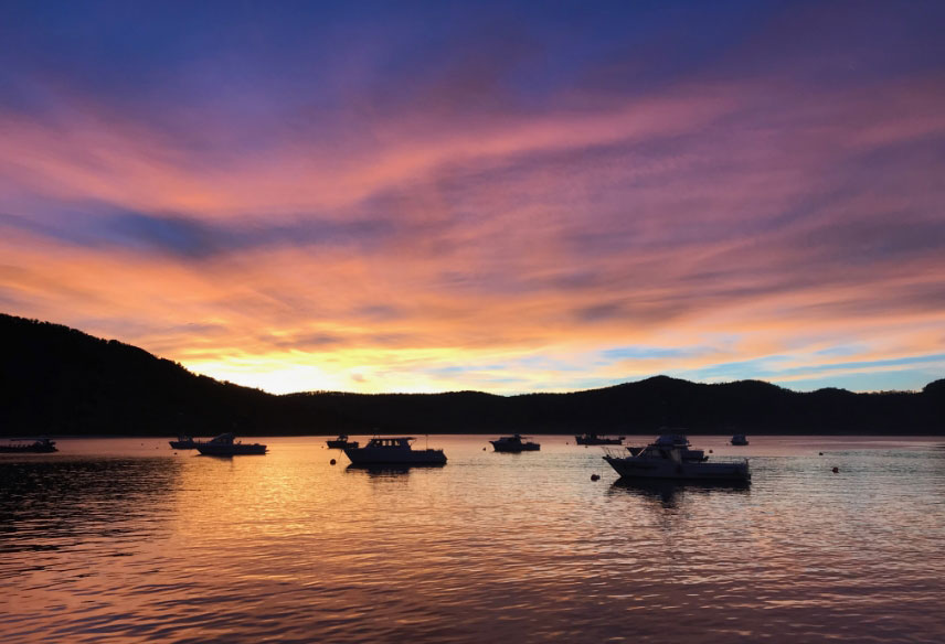 Commercial vessels moored at Pirates Bay, Tasmania